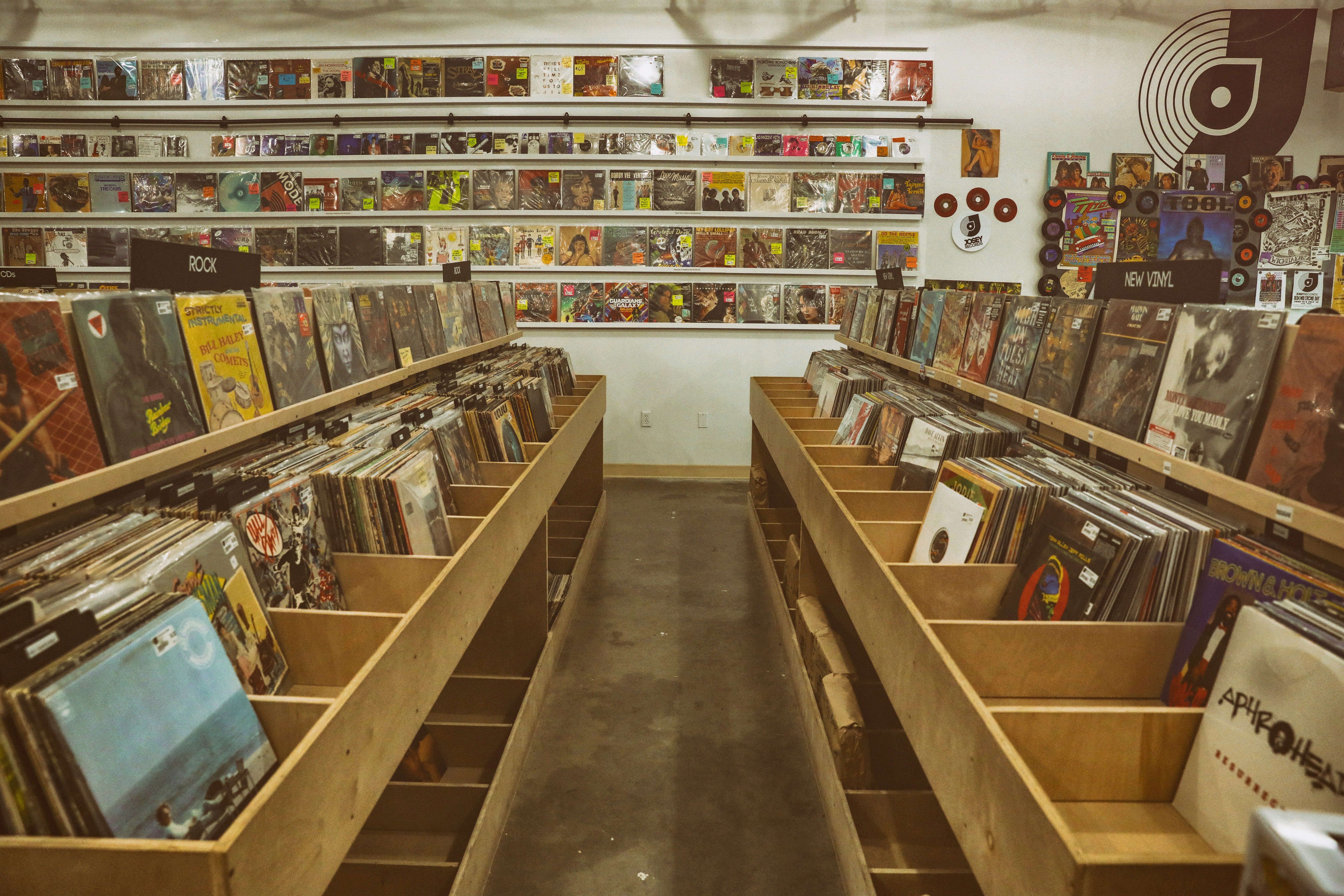 brown wooden shelf with books